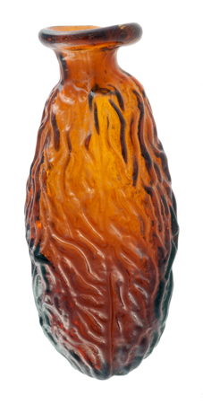 Balsamari soffiati dentro matrice bivalve, di vetro marrone, a forma di dattero, di grande effetto naturalistico, utilizzati per il commercio di un olio profumato, forse ricavato proprio dal frutto a cui la forma allude.